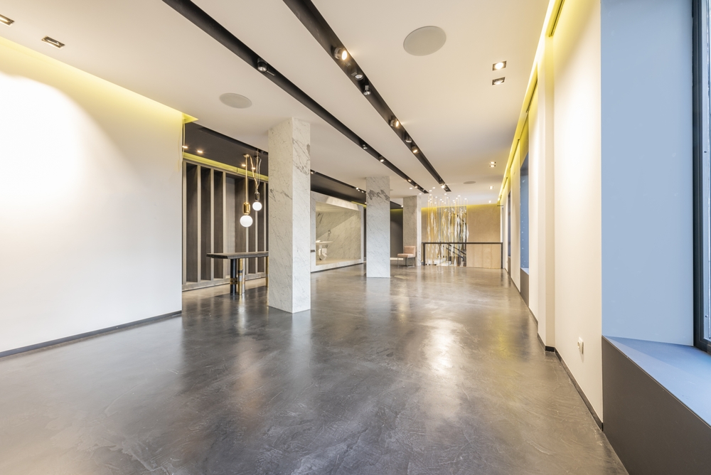 An,empty,commercial,premises,with,polished,concrete,floors,and,installation