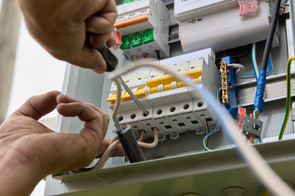 Fastening,circuit,breakers,to,din,rail,of,consumer,unit,of