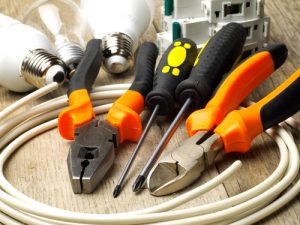 Set,of,electrician,tools,,a,coil,of,wire,and,equipment
